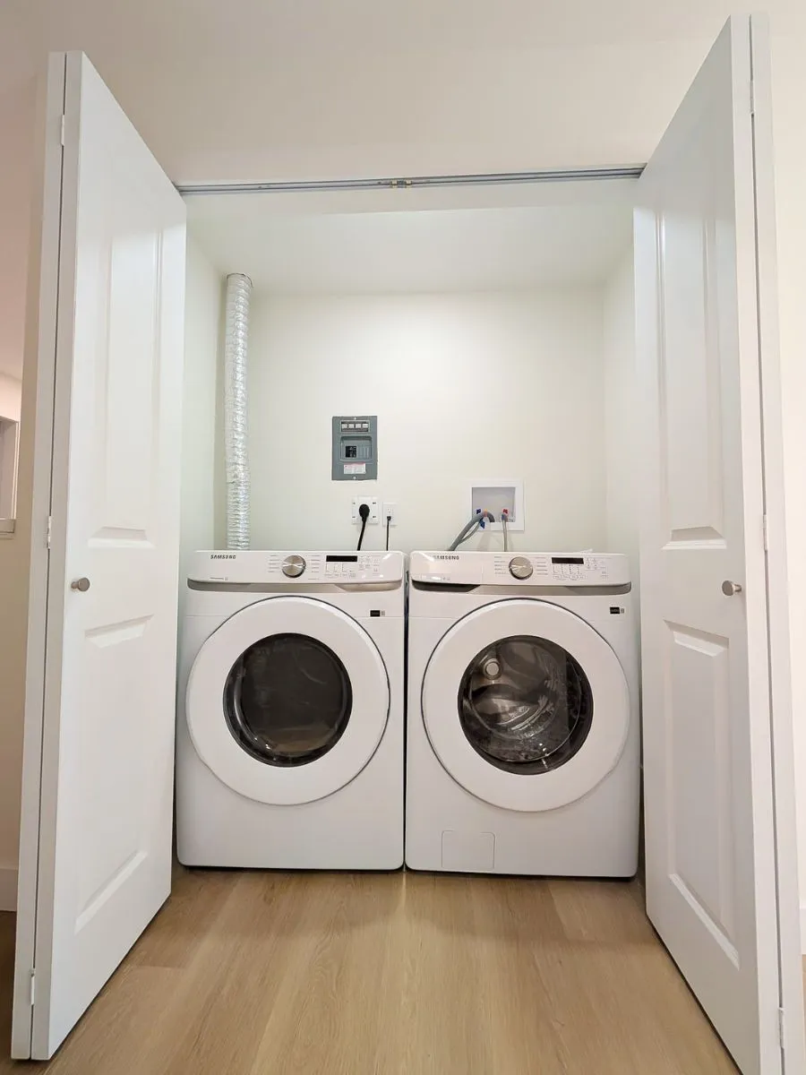 Updated laundry room with new floors and paint